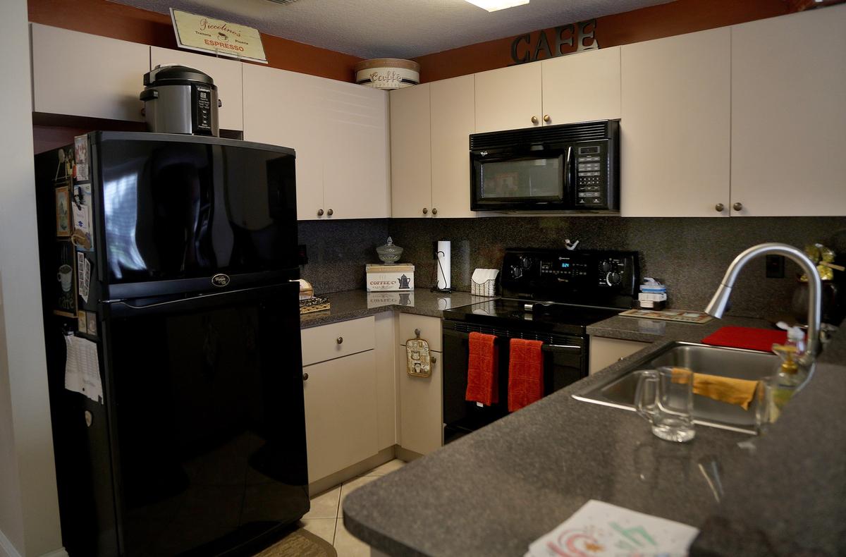 Kitchen view of a property for sale at 13801 NW 84th Ct. #2504, in Miami Lakes. The family selling it, with four boys, said they’ve outgrown the space.