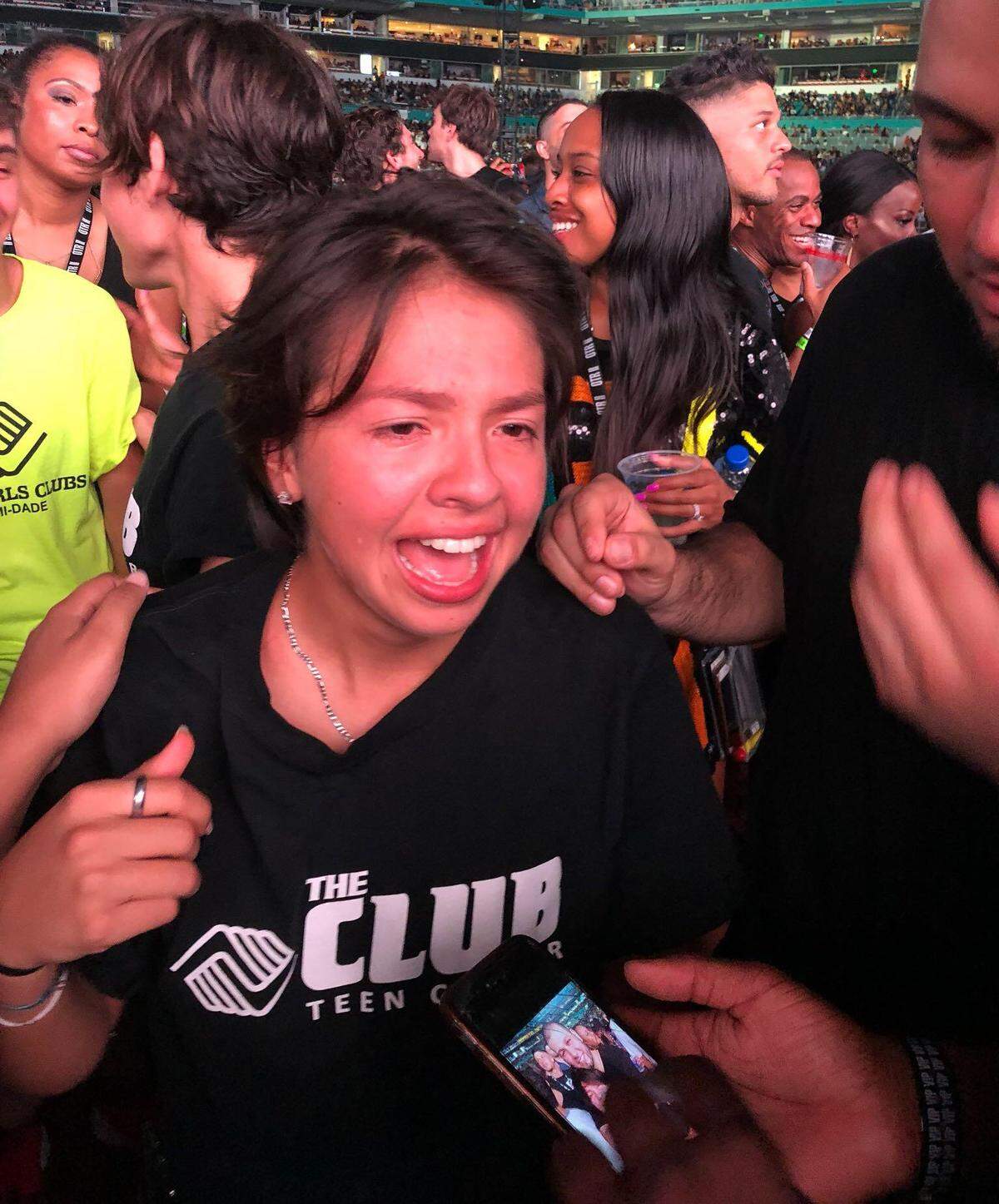 Emily Garay, 17, reacts when she learns she received a $100,000 college scholarship from Beyoncé and Jay Z at the pair’s Hard Rock Stadium concert in Miami Gardens on Aug. 31, 2018.
