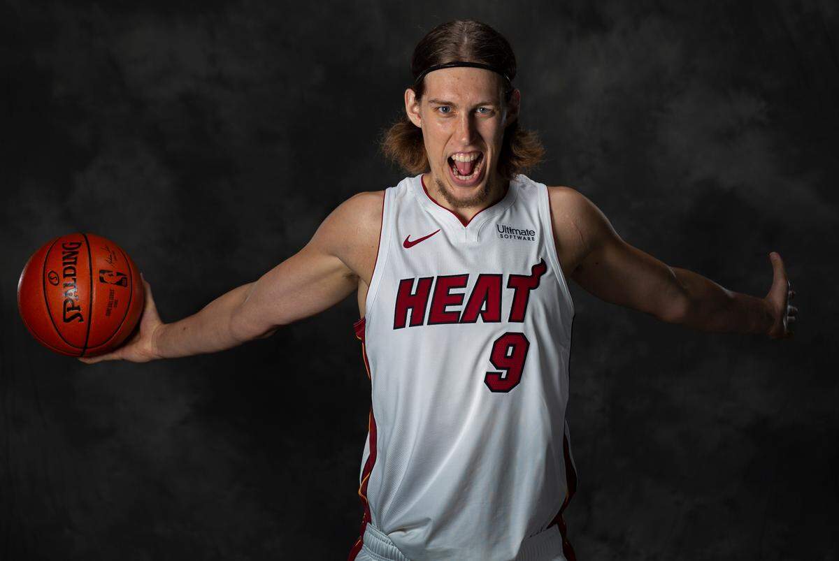 Miami Heat’s Kelly Olynyk (9) poses for a photograph during Miami Heat media day at the American Airlines Arena in Miami on Monday, September 24, 2018.