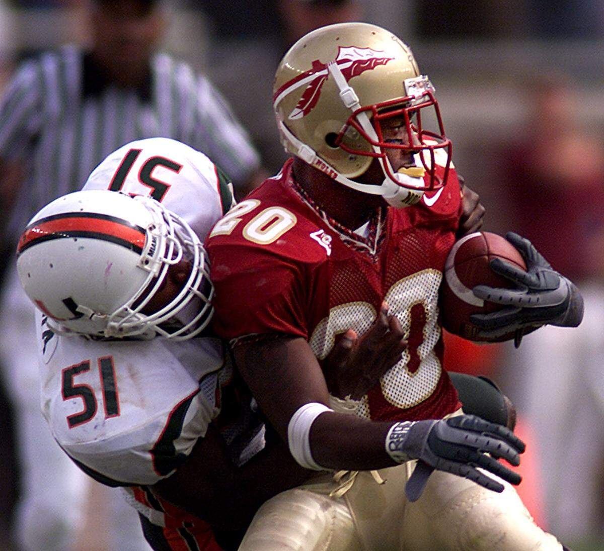 In 2001 at Doak Campbell Stadium in Tallahassee, UM's Jonathan Vilma takes down FSU's Nick Maddox.
