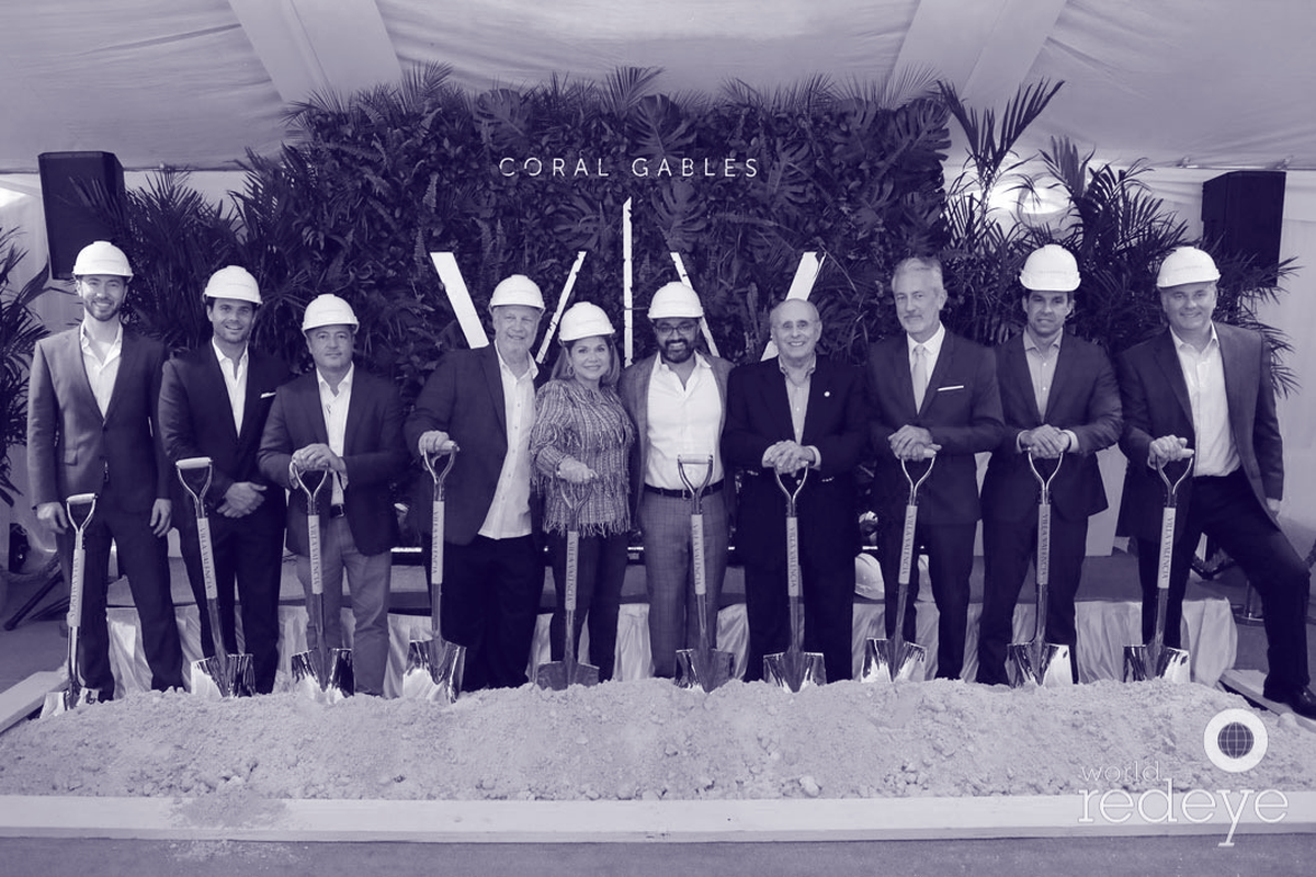 Rishi Kapoor, center, and then-Vice Mayor Vince Lago, second from right, pose with hardhats and shovels at the groundbreaking for Villa Valencia in June of 2019.