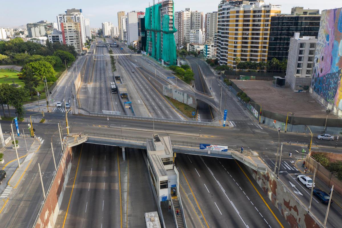 The Via Expresa highway, closed by the government to discourage citizens from circulating, is free of traffic in Lima, Peru, on Thursday, March 19, 2020, the fourth day of a state of emergency decreed by the government to prevent the spread of the new coronavirus.