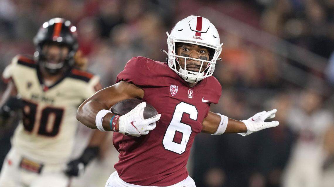 Oct 8, 2022; Stanford, California, USA; Stanford Cardinal wide receiver Elijah Higgins (6) carries the ball against the Oregon State Beavers during the second quarter at Stanford Stadium. Mandatory Credit: Darren Yamashita-USA TODAY Sports