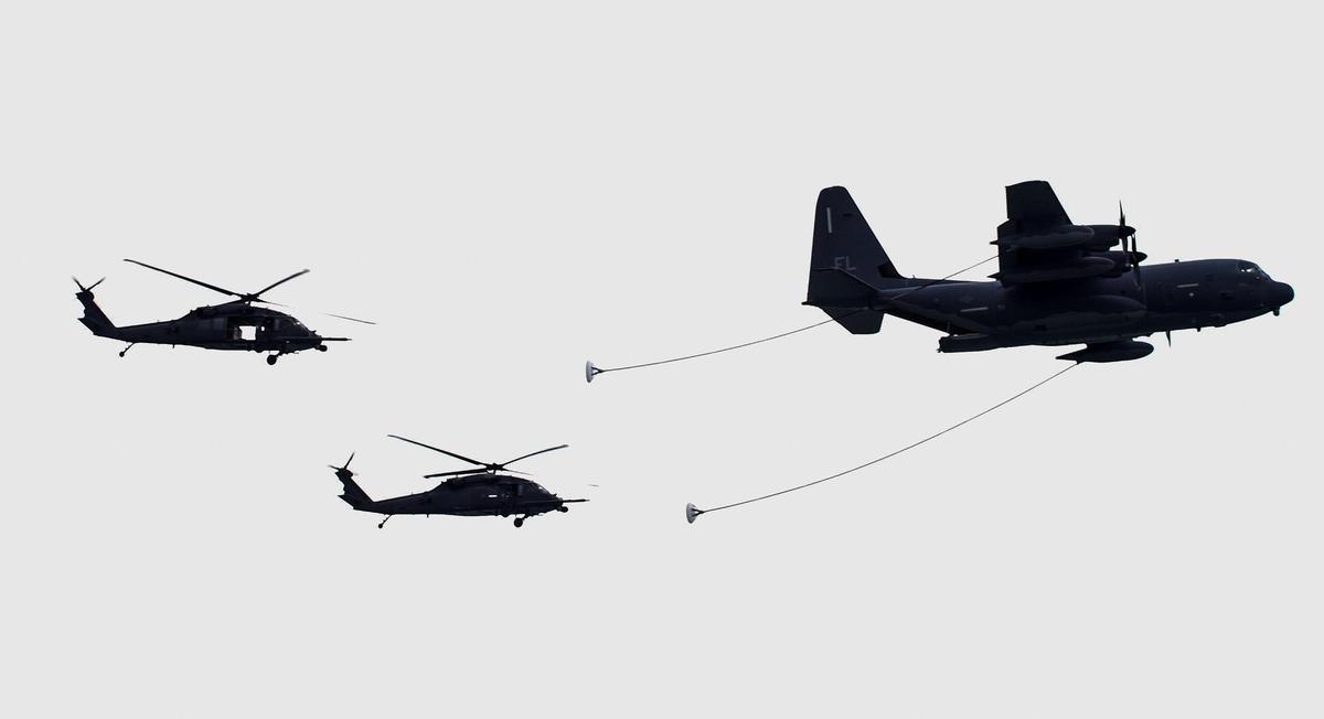 Fuel tanker demonstrate in-air fueling of two helicopters during the Hyundai Air and Sea Show over Miami Beach on Sunday, May 29, 2022.