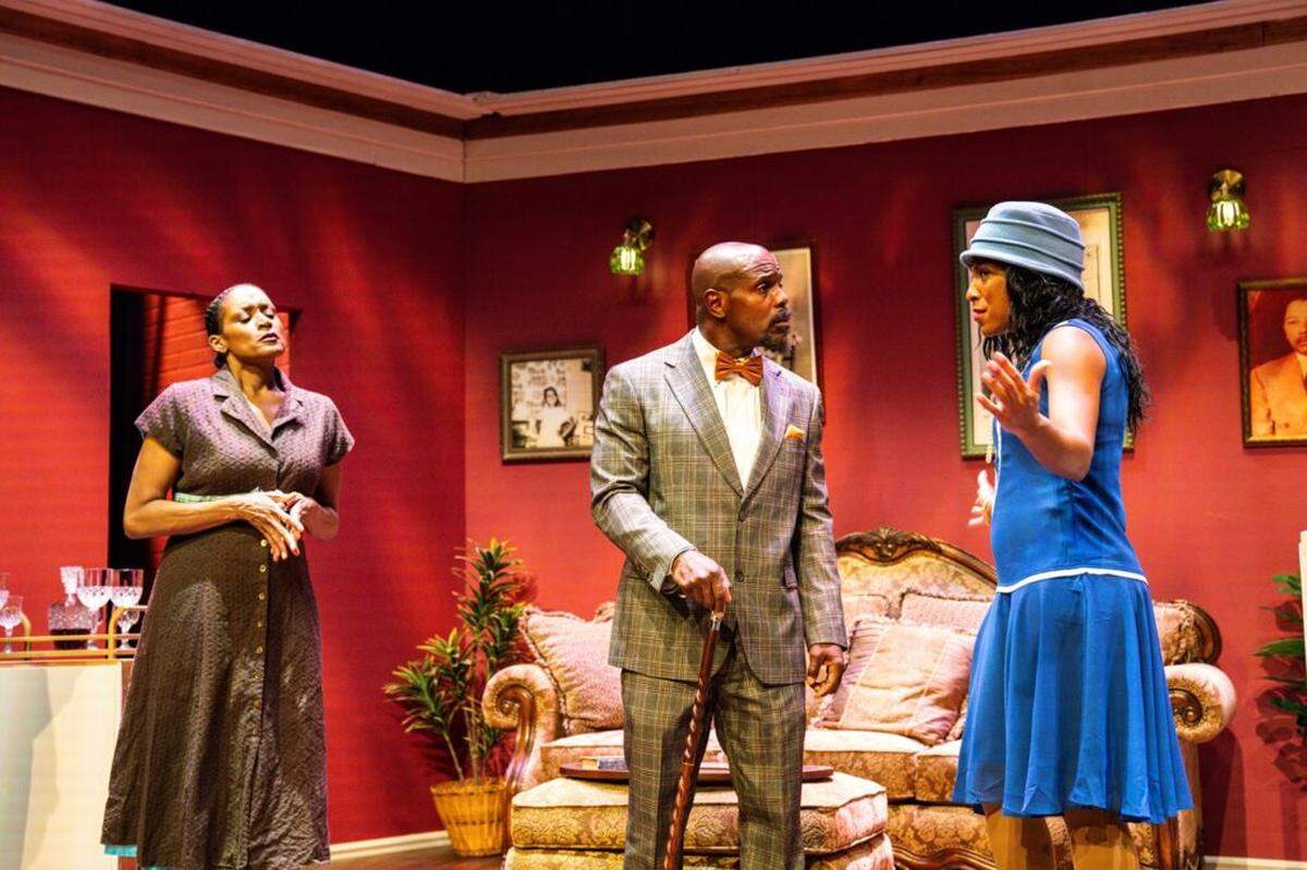 Nina (Lela Elam) and W.E.B. Du Bois (Charles Reuben) listen to what’s going on with daughter Yolande (Dina Lewis) in Charles Smith’s “Knock Me a Kiss.”