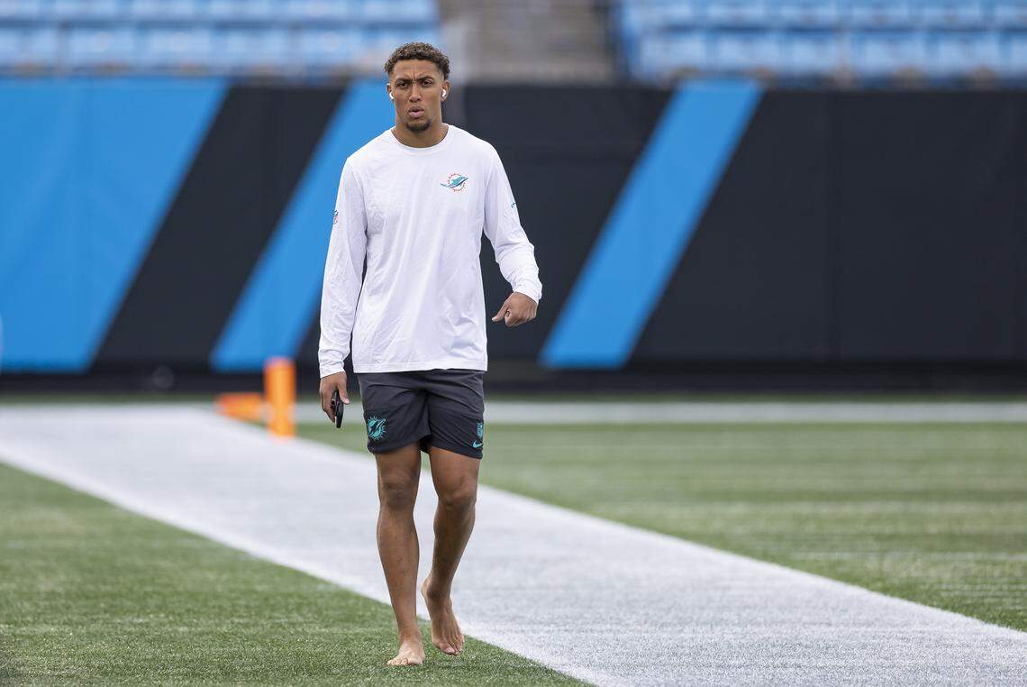 Miami Dolphins wide receiver Nick Westbrook-Ikhine (18) walks on the field before playing against the Carolina Panthers in their NFL game at the Bank of America Stadium on Sunday, Oct. 5, 2025, in Charlotte, N.C.