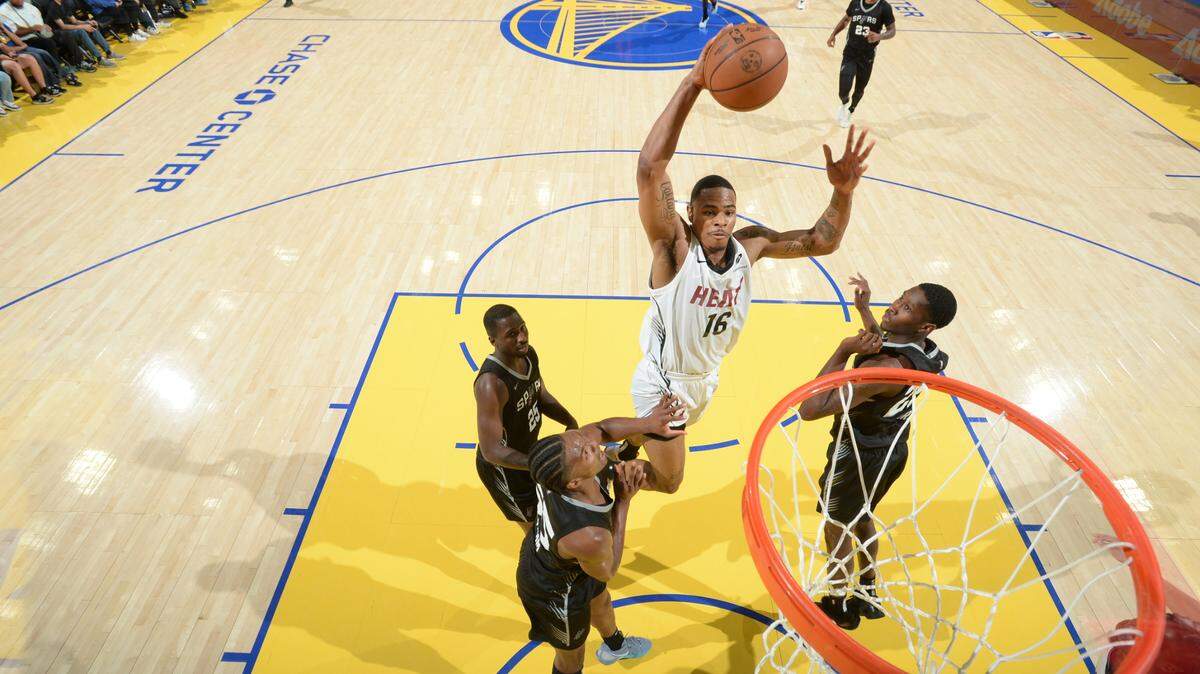 Keshad Johnson #16 of the Miami Heat dunks the ball during the game against the San Antonio Spurs during the 2025 NBA California Classic on July 5, 2025 at Chase Center in San Francisco, California.