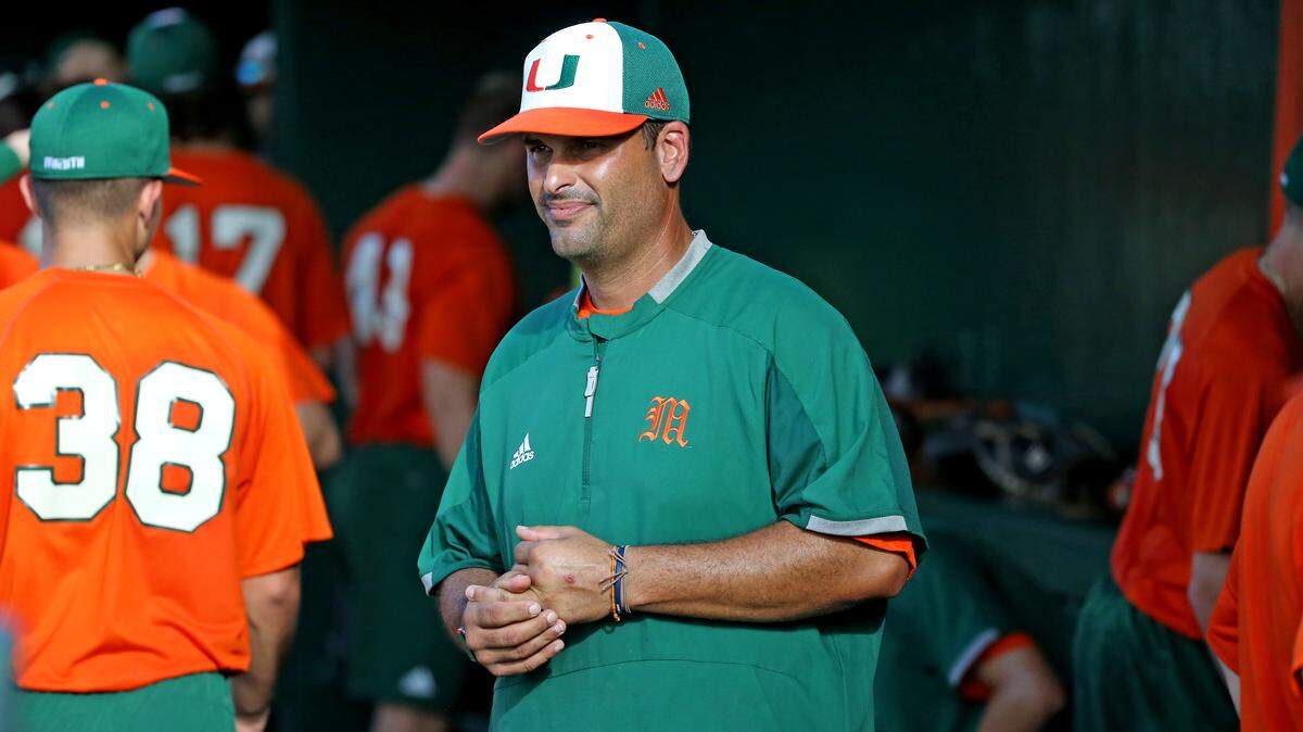 Miami Hurricanes associate head coach/pitching coach J.D. Arteaga look on before the start of a NCAA baseball game against the Florida Atlantic University at Alex Rodriguez Park at Mark Light Field on Wednesday, February 20, 2019 in Coral Gables.