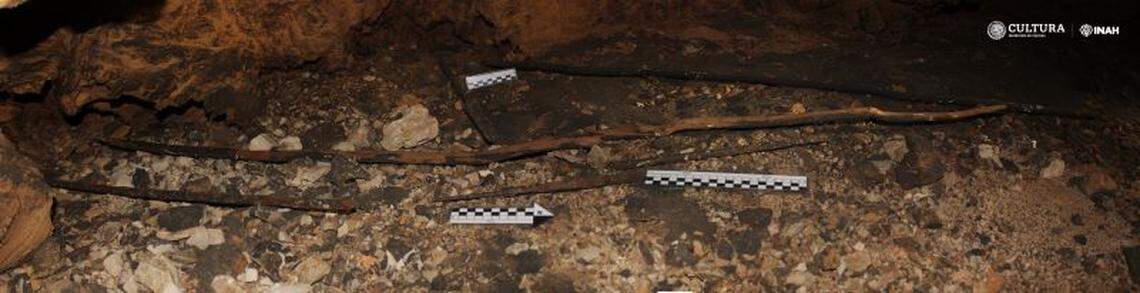 Archaeologists said the found the dart thrower, darts and digging sticks near each other in the cave.