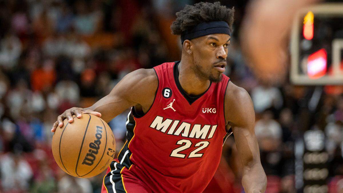 Miami Heat forward Jimmy Butler (22) drives with the ball against the Memphis Grizzlies during the third quarter of an NBA game at Miami-Dade Arena on Wednesday, March 15, 2023, in Miami.