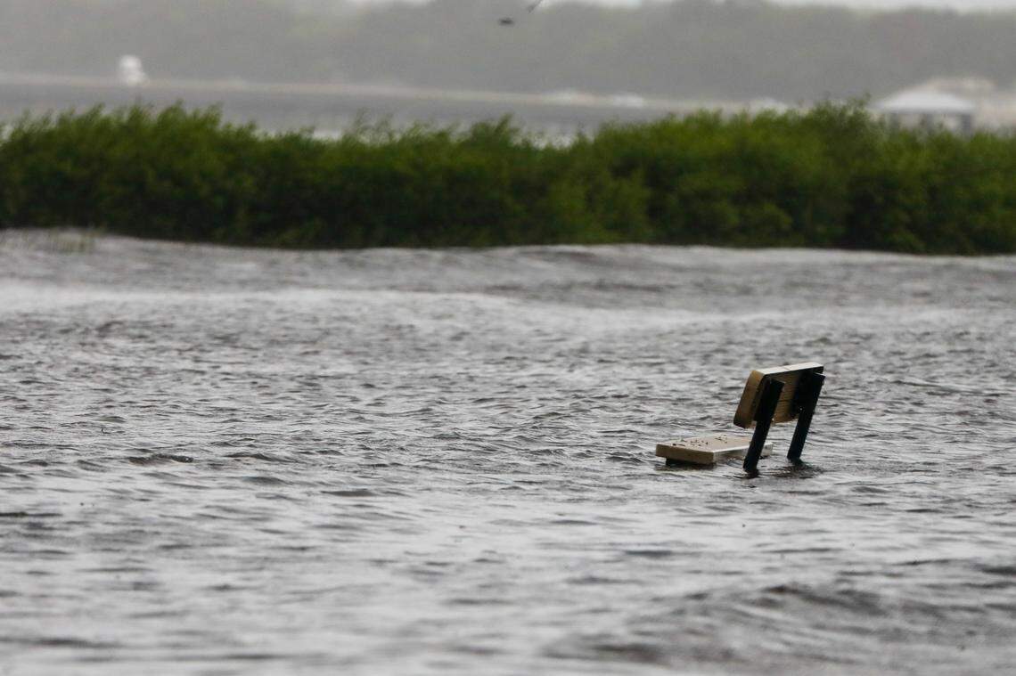 A bench is submerged in water near the R.E. Olds Park on Monday, Aug. 5, 2024, in Oldsmar.