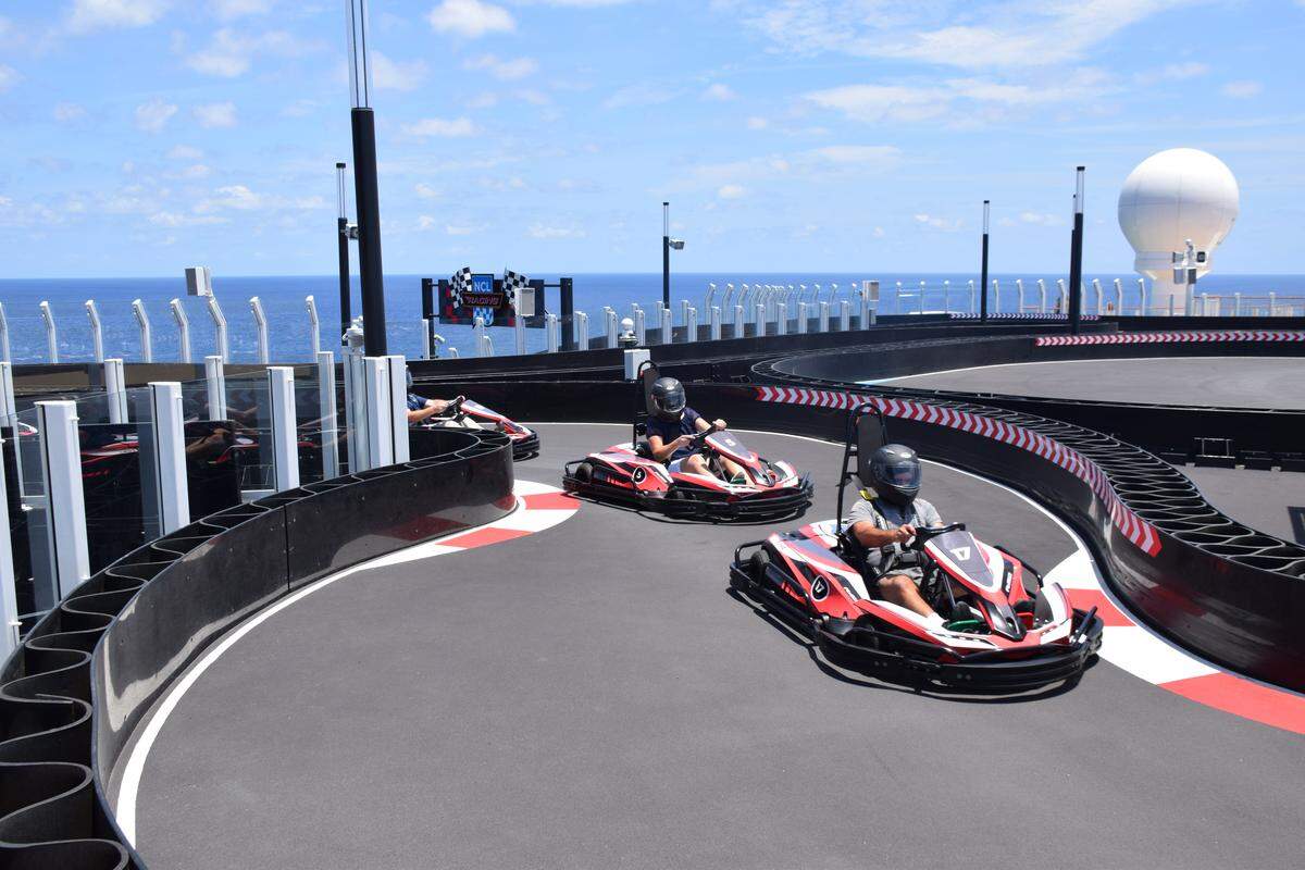 Go-karts zip around the two-level Race Track aboard the Norwegian Bliss. The karts can travel up to 30 mph and are available to ride for $7 per passenger.