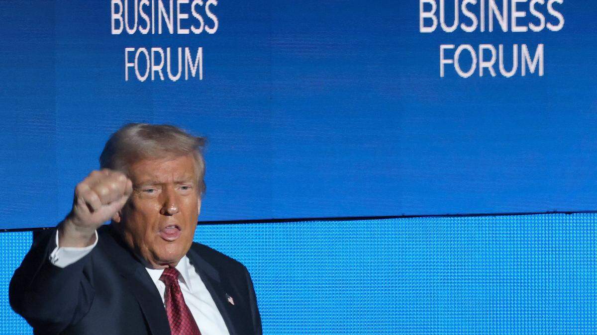 President Donald J. Trump pumps his fist while exiting the stage during the American Business Forum at the Kaseya Center in Miami, Florida on Wednesday, November 5, 2025.
