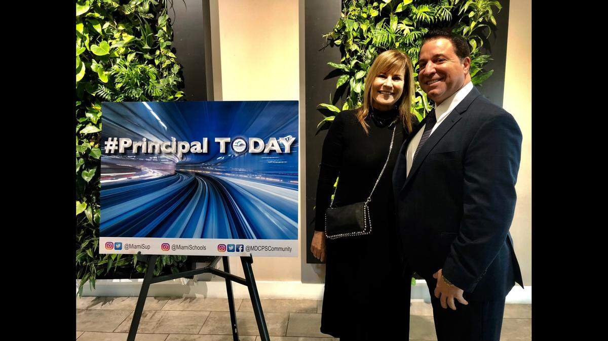 Diana Venturini, the executive director for fund and resource development for Miami-Dade schools, and Anthony Damato attend a Principal Today breakfast where community leaders are selected to serve as principals for a day. Damato served at William J. Bryan Elementary School for 4 years.