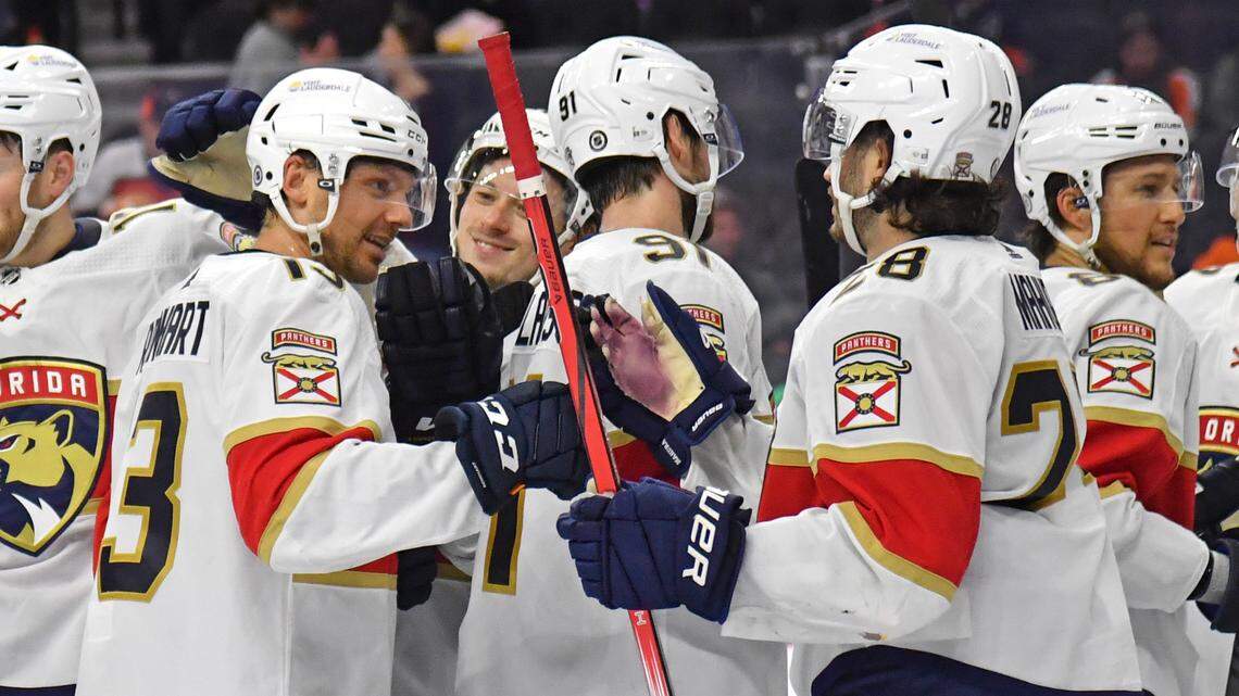 Mar 24, 2024; Philadelphia, Pennsylvania, USA; Florida Panthers center Sam Reinhart (13) celebrates win with teammates against the Philadelphia Flyers at Wells Fargo Center.
