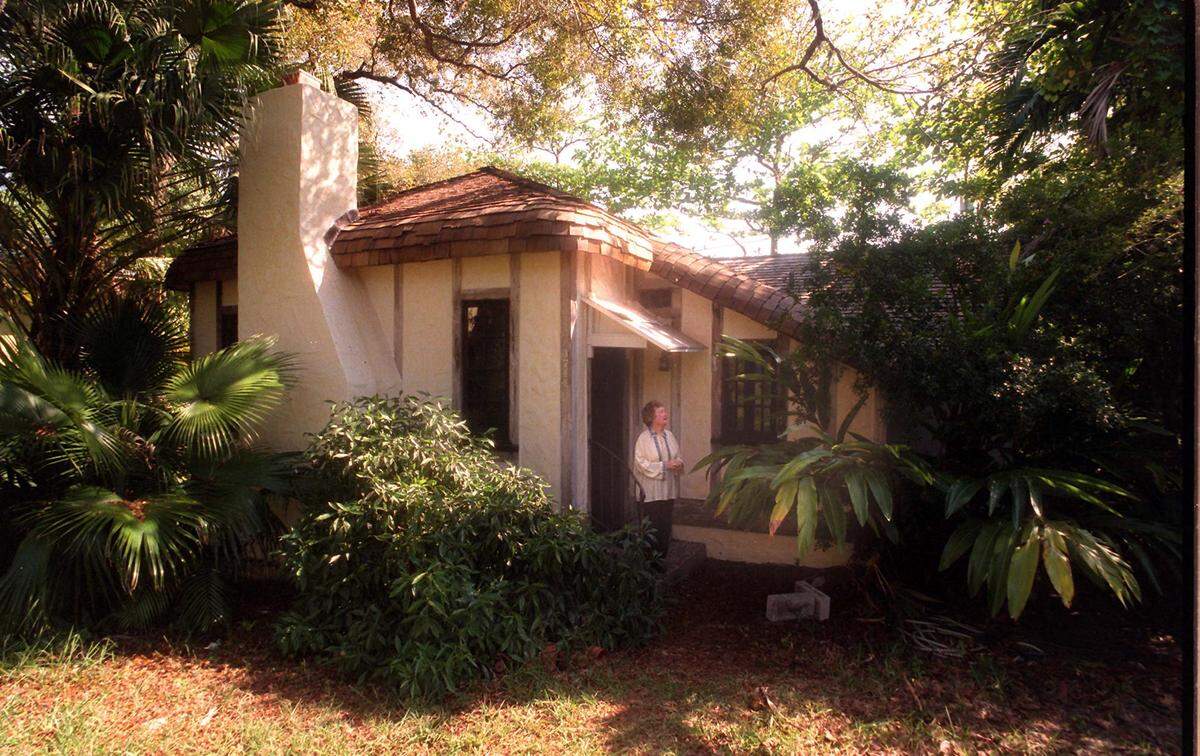 Sally Jude, president of The Land Trust standing on the doorsteps of the Marjory Stoneman Douglas 1926 Brit-styled bungalow in Coconut Grove, in 2001. On April 7, the Friends of the Everglades, the group Douglas founded 50 years ago, will unveil the Florida Historical Marker that will be placed in front of Douglas’ home. Douglas died in 1998 at 108 years old.