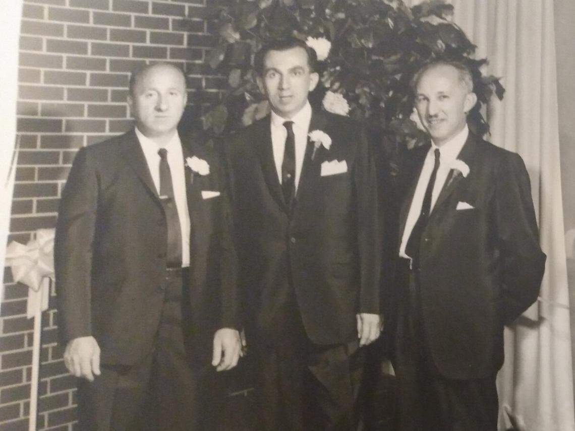Shlomo Szlamkowicz, a Holocaust survivor, is pictured here between his two brothers. He is the grandfather of Benjamin Szlamkowicz, who created a petition to remove the Boca Raton principal.