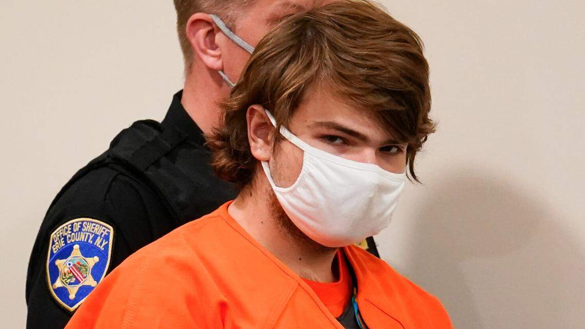 Payton Gendron, accused of shooting 10 people to death at a Buffalo, New York, supermarket, is led into the courtroom for a hearing in May.