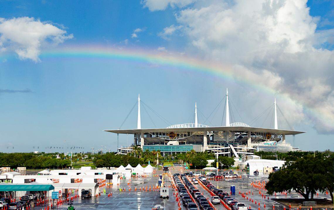 A view of a rainbow as vehicles line up at the COVID-19 drive-thru testing center at Hard Rock Stadium in Miami Gardens as the coronavirus pandemic continues on Sunday, July 19, 2020.