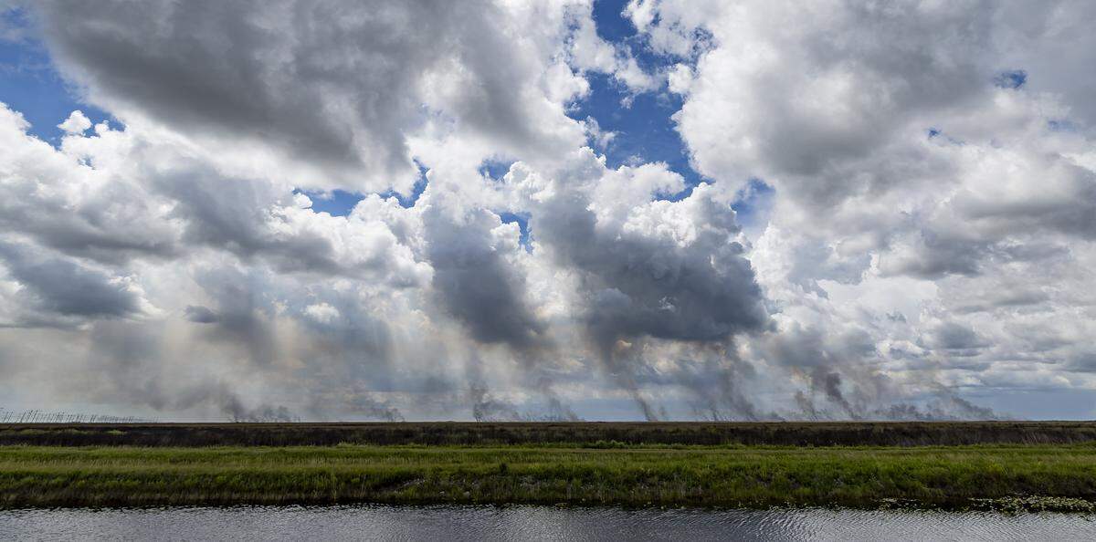 A view of an Everglades wildfire can be seen near US Highway 27 and Alligator Alley on Thursday, Aug. 21, 2025, in South Florida.