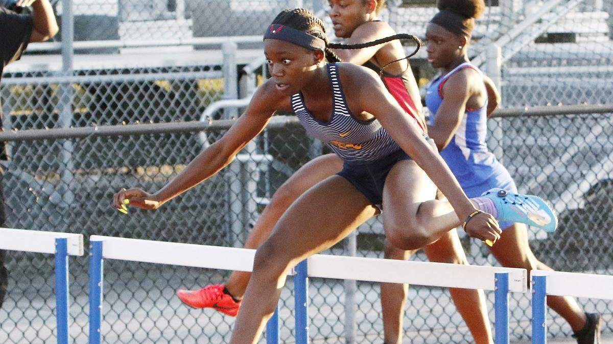 Eddiyah Frye of St. Thomas Aquinas wins the girls 100 m hurdles during the 2018 BCAA Track and Field Championships finals , March 23, 2018 at Dillard High in Fort Lauderdale