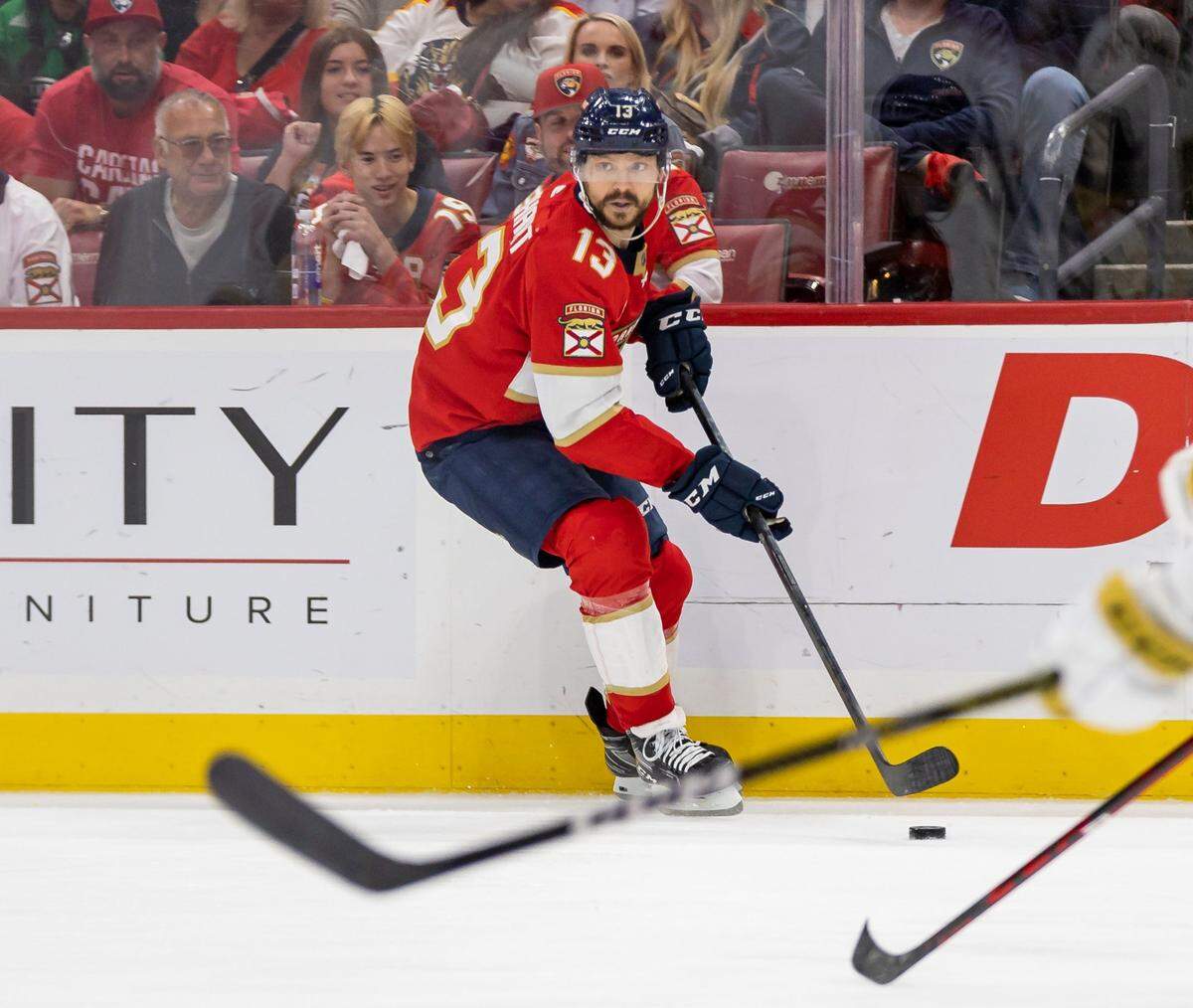 Florida Panthers center Sam Reinhart (13) looks to pass the puck against Vegas Golden Knights in the third period of Game 4 of the NHL Stanley Cup Final at the FLA Live Arena on Saturday, June 10, 2023, in Sunrise, Fla.