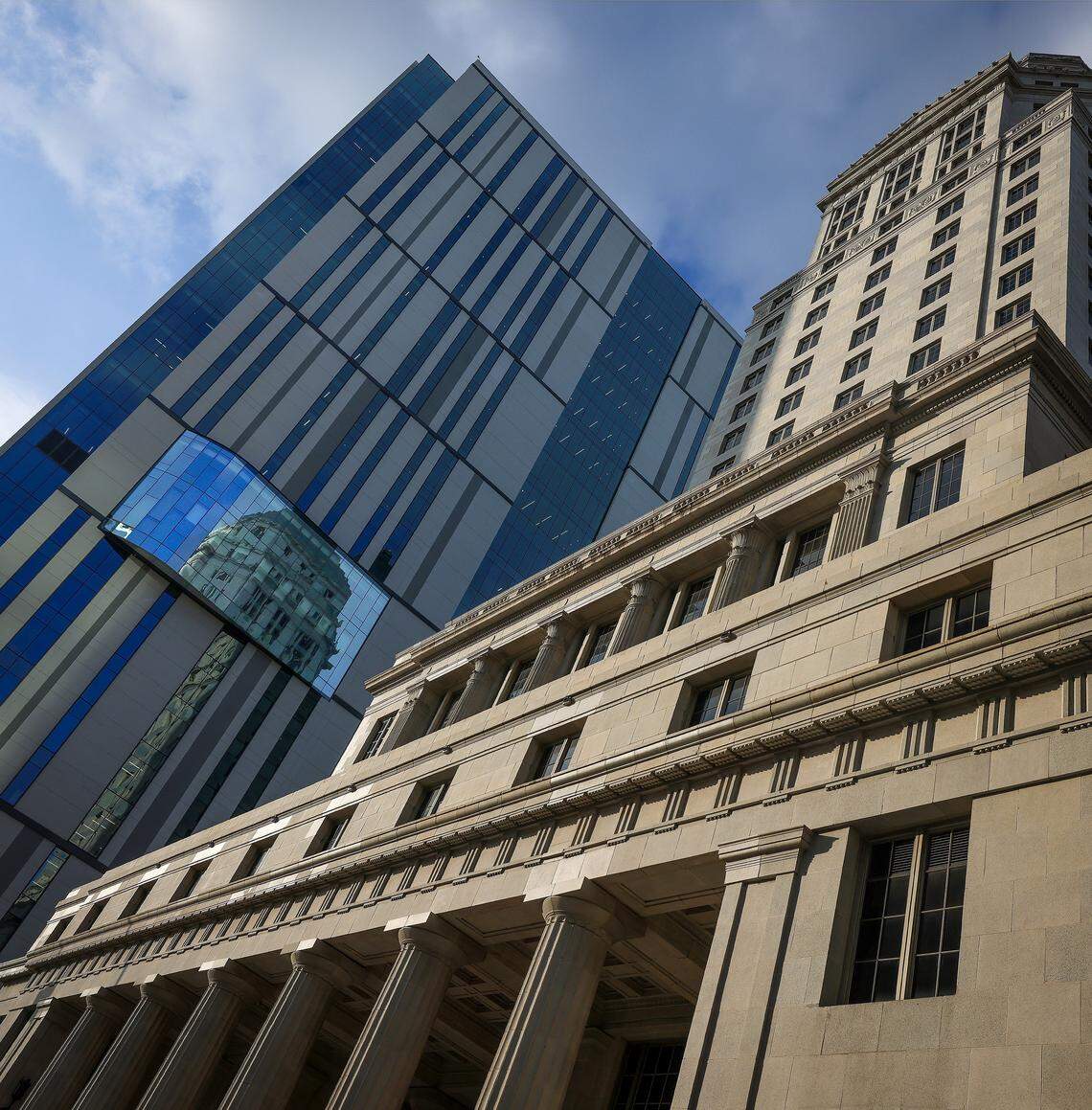 The reflection of the historic Dade County Courthouse is viewed on the glass windows of the new Osvaldo N. Soto Miami-Dade Justice Center, which replaced it on Wednesday, January 14, 2026, in Miami, Florida. The Dade County Courthouse is significant as an excellent example of Neo-Classical architecture. The detailing of the remaining historic interior spaces and features continue to reflect this distinctive style and contributes to a more complete understanding of the historic character of the Courthouse.