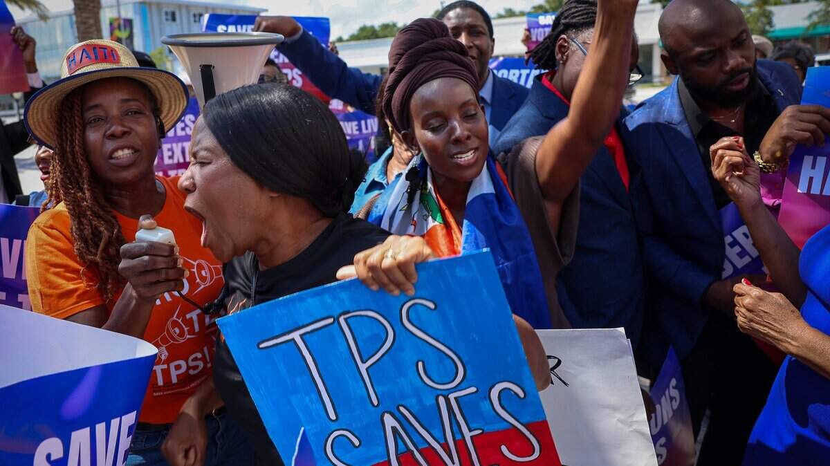 In the center, Anne Pierre, center takes to the bullhorn as she chants in support of the extension of TPS as Family Action Network Movement (FANM), alongside South Florida partners, led a rally on Sunday, April 26, 2026, calling on federal decision-makers to extend Temporary Protected Status (TPS) for Haitian nationals at the MoCA Plaza in North Miami, Florida. The mobilization comes at a critical moment as the Supreme Court of the United States prepares to hear oral arguments on the administration's attempt to terminate TPS for Haiti. The decision could place more than 350,000 Haitian nationals at risk of losing protection from deportation and work authorization, threatening the stability of their families. The April 26 event in North Miami is part of a broader series of pre-oral argument mobilizations, including actions in Atlanta on April 18 and in Washington, D.C., in front of the Supreme Court on April 29, coinciding with oral arguments.