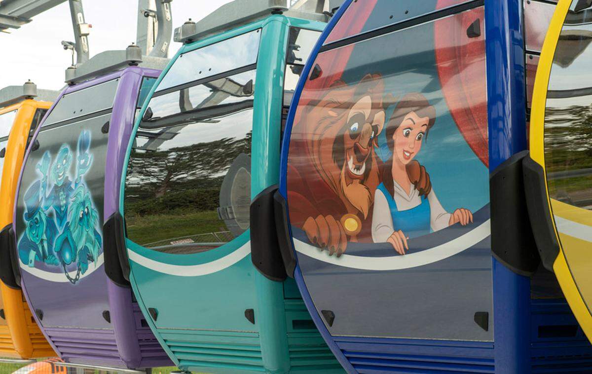 Art wraps on the Disney Skyline gondolas will feature an assortment of Disney characters and movies, like the Haunted Mansion, Beauty and the Beast, Stitch and Mickey Mouse.