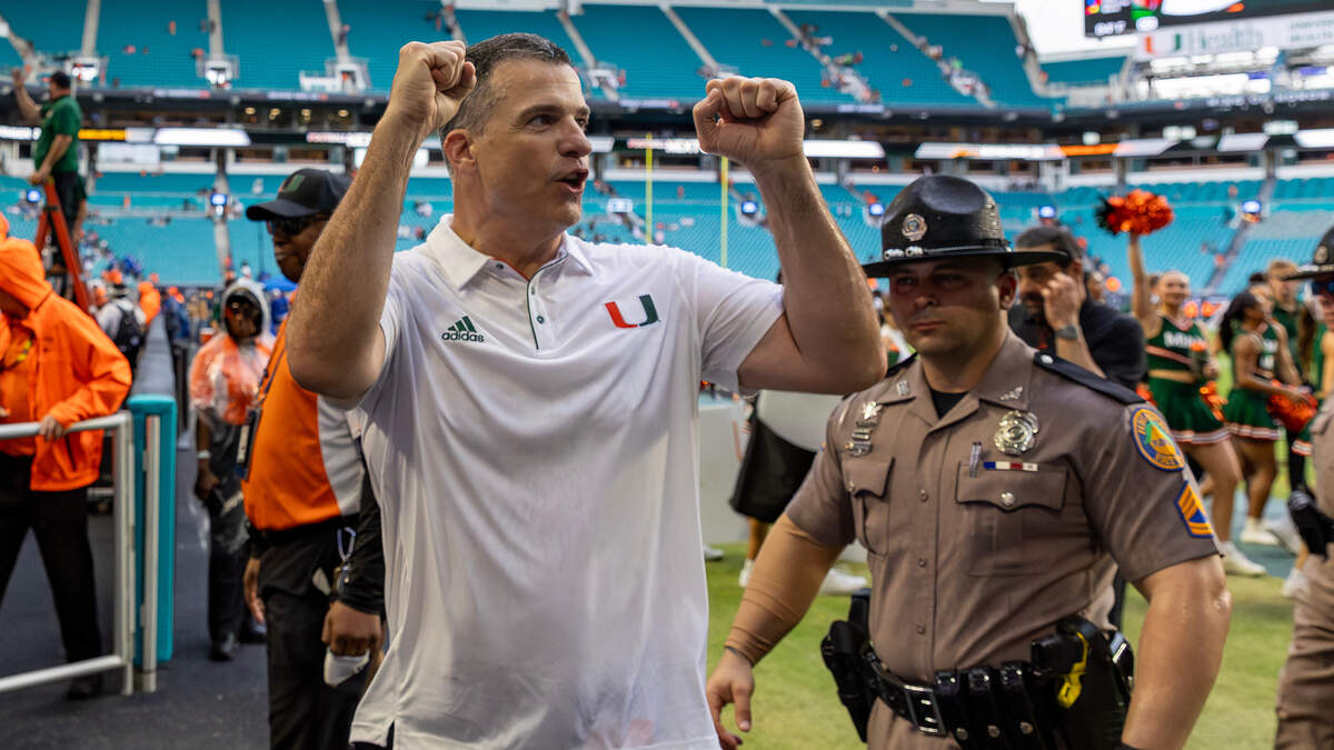Miami Hurricanes head coach Mario Cristobal celebrates with fans after their win over the Duke Blue Devils during an ACC football game at Hard Rock Stadium on Saturday, Nov. 2, 2024, in Miami Gardens, Fla.