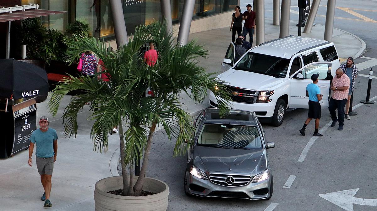 Customers leave their cars on June 26, 2018, at the valet parking station in Dadeland Mall, as some people like the convenience of it and some others hate how it monopolizes prime spaces. These days It's everywhere: Hotels, restaurants, malls, doctor's offices and even churches now offer valet parking.
