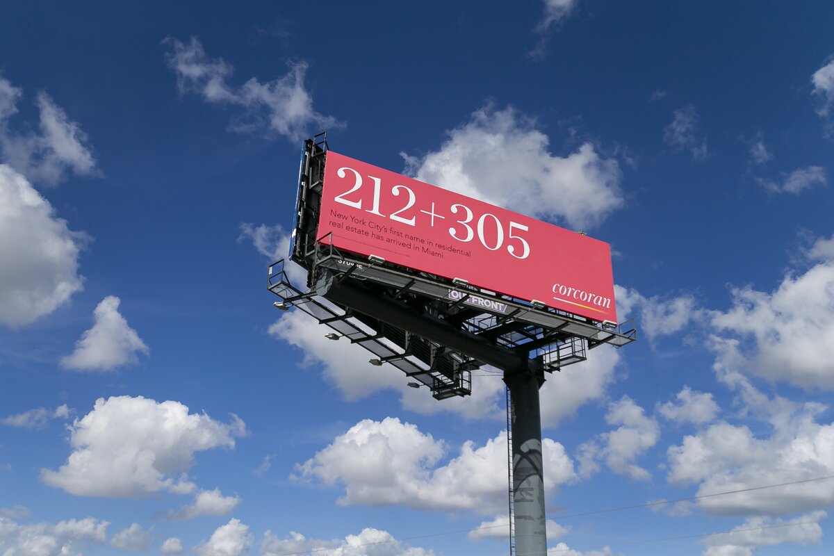 A billboard with the area codes “212+305” can be seen on Interstate 195 heading westbound near Miami’s Design District on Tuesday, November 12, 2019.