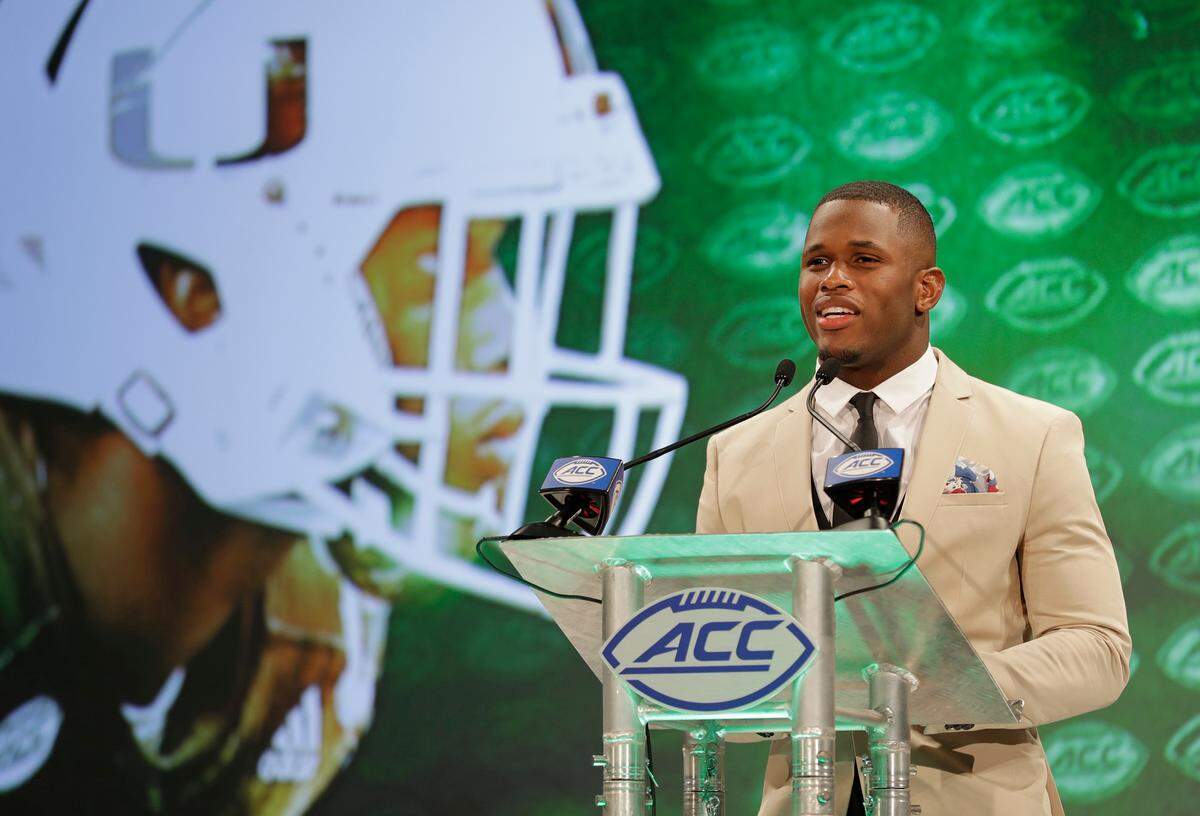 Miami safety Jaquan Johnson, shown answering a question during the Atlantic Coast Conference Football Kickoff in Charlotte, N.C., before the season, refuses to give up or give in to a losing streak entering Virginia Tech.