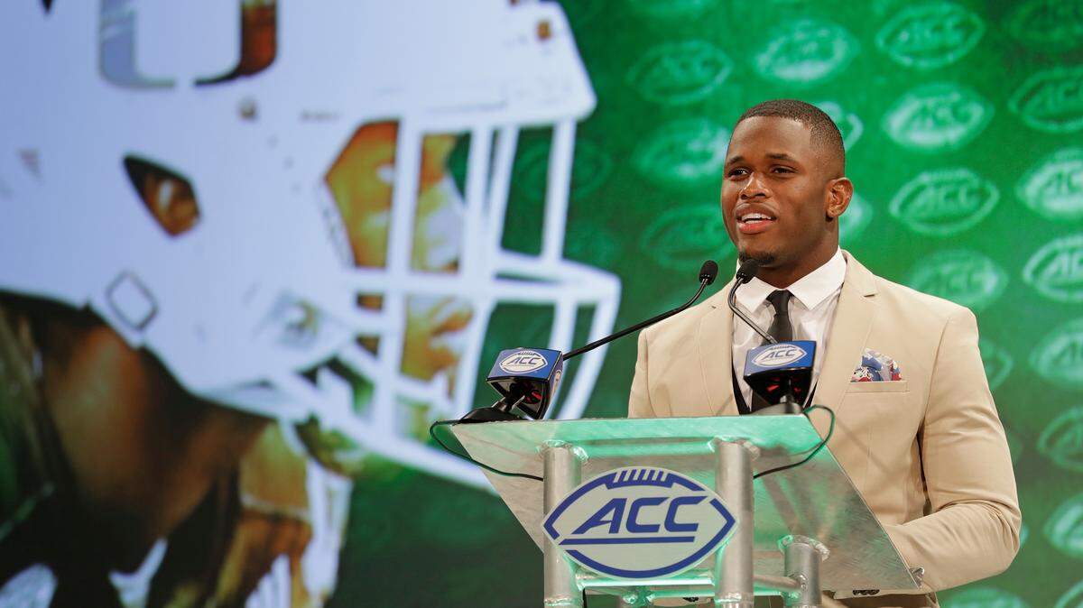 Miami safety Jaquan Johnson, shown answering a question during the Atlantic Coast Conference Football Kickoff in Charlotte, N.C., before the season, refuses to give up or give in to a losing streak entering Virginia Tech.