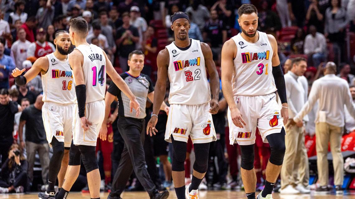 Miami Heat players walk off the court during the fourth quarter of an NBA game against the Cleveland Cavaliers at Miami-Dade Arena in Downtown Miami, Florida, on Wednesday, March 8, 2023. Miami went on to lose 104-100 to Cleveland.