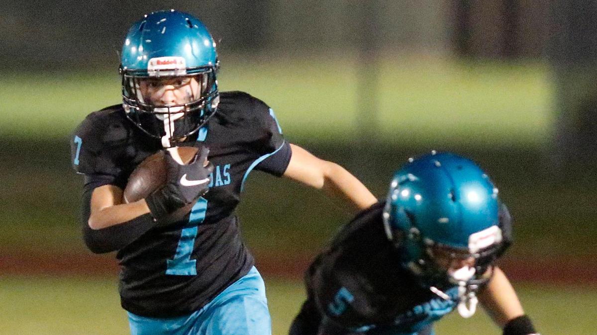 Coral Reef Barracudas running back Sebastian De Armas (7) runs the ball against Ferguson Falcons during the GMAC Independent Conference title football game on Thursday, November 14, 2024 at Southridge HS in Miami. Andrew Uloza / for Miami Herald