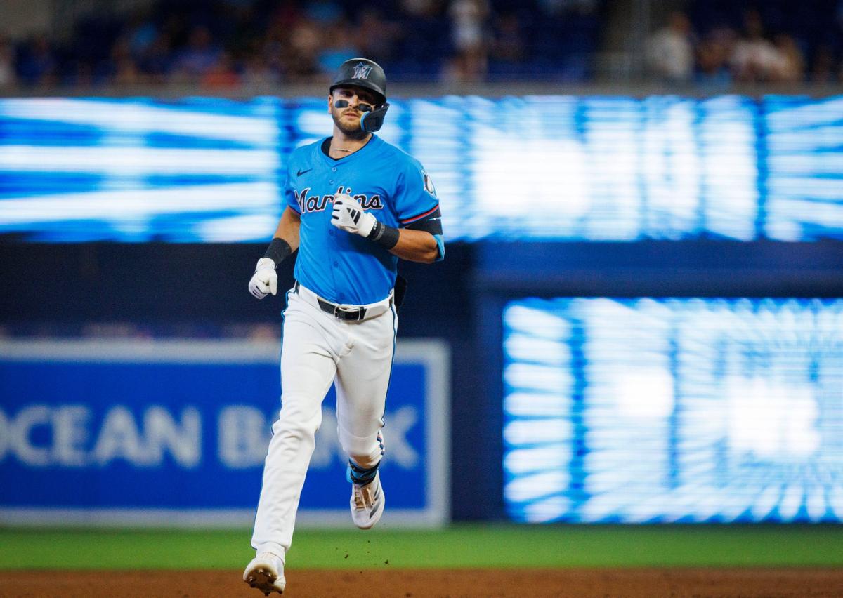 Miami Marlins designated hitter Connor Norby (24) hits a home run during the first inning of a baseball game against the Chicago Cubs on Sunday, Aug. 25, 2024, at loanDepot Park in Miami, Fla.