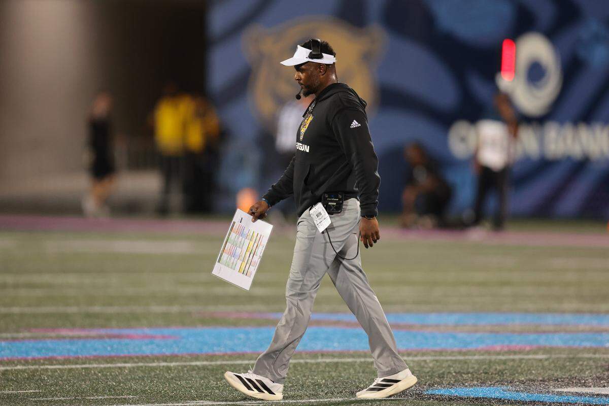 FIU Panthers head coach Willie Simmons walks off the field after injury timeout against the Kennesaw State Owls during the third quarter at Pitbull Stadium in Miami, Florida, Tuesday, October 21, 2025.