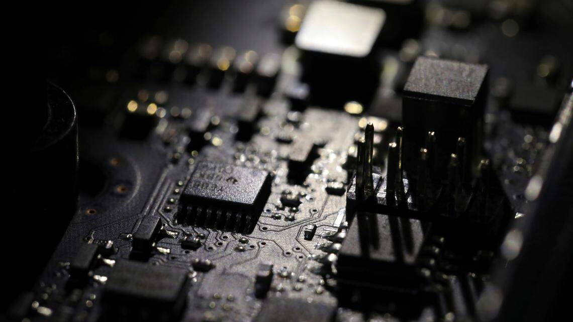 The Canadian man was overseas when authorities said they found a computer full of emails about stolen identities.