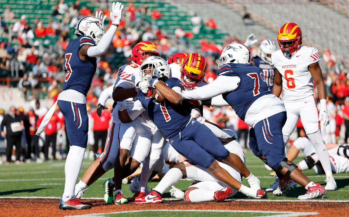Chaminade-Madonna Lions Davion Gause (7) scores against the Clearwater Central Catholic Marauders in the first quarter during the Class 1M, Region 3, District 6, State Championship game at Bragg Memorial Stadium in Tallahassee, Florida, on Thursday, December 7, 2023.