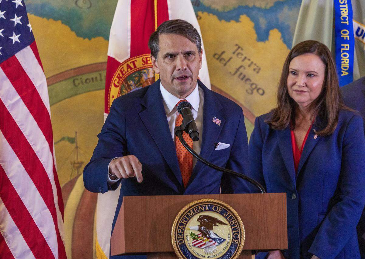 Acting U.S. Attorney General Todd Blanche speaks in Miami on Wednesday, May 20, 2026, about the federal indictment of Raúl Castro. Next to him is U.S. Senator Ashley Moody.