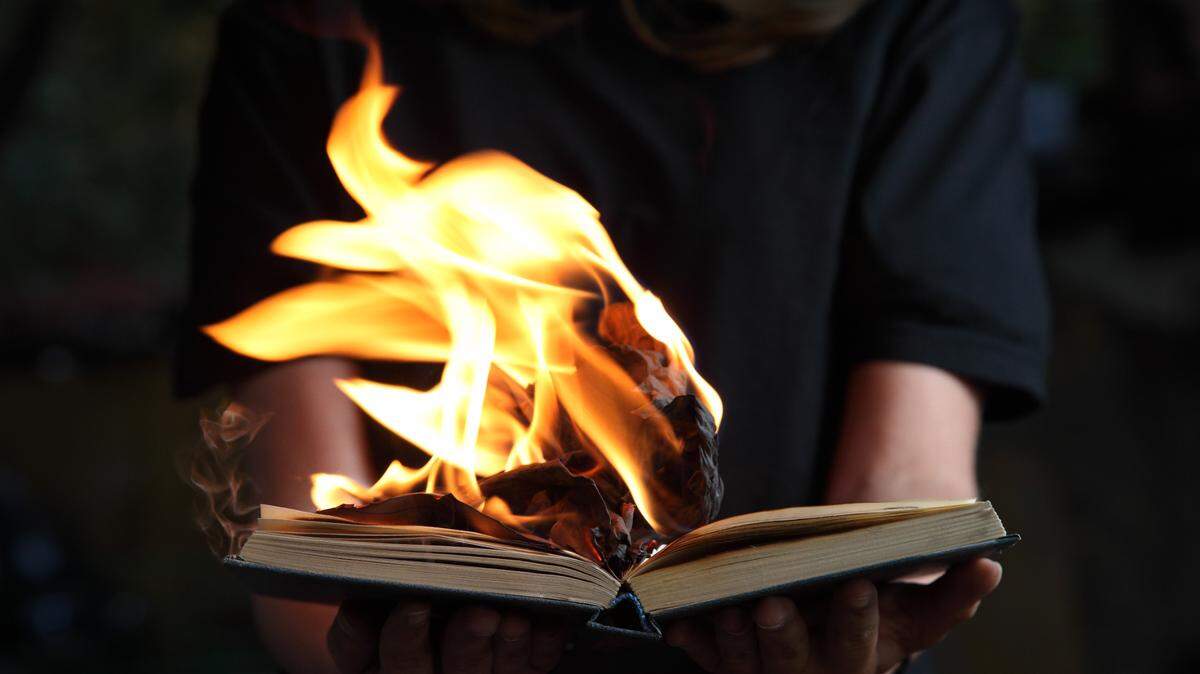 The persecution of authors and ceremonial book burnings let the Nazis to stifle free speech in Germany.