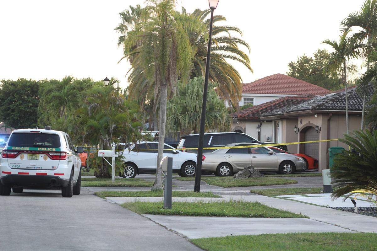 Miami-Dade deputies at 17036 SW 153rd Ct. on Dec. 6, 2025, investigate the deaths of a man and woman they identified the following day as Ulises Cabrera Gonzalez and Susana Rosales Koris.
