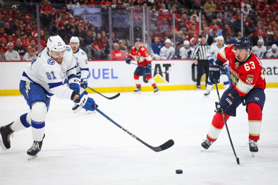 Florida Panthers center Brad Marchand (63) takes the puck passes Tampa Bay Lightning defenseman Erik Cernak (81) during the third period of Game 3 of the first-round Stanley Cup playoff series on Saturday, April 26, 2025, at Amerant Bank Arena in Sunrise, Fla. The Tampa Bay Lightning won.