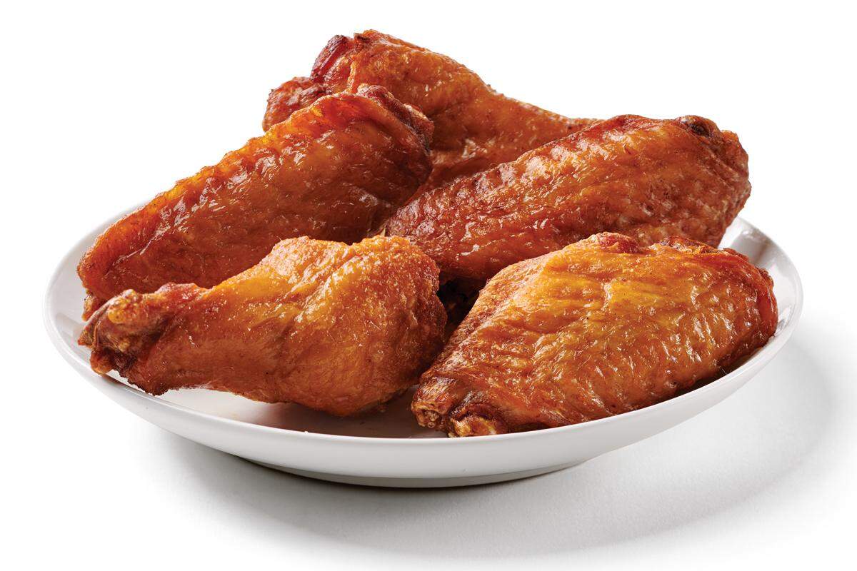 The wings are marinated in a citrus sauce for 24 hours and are never frozen.
