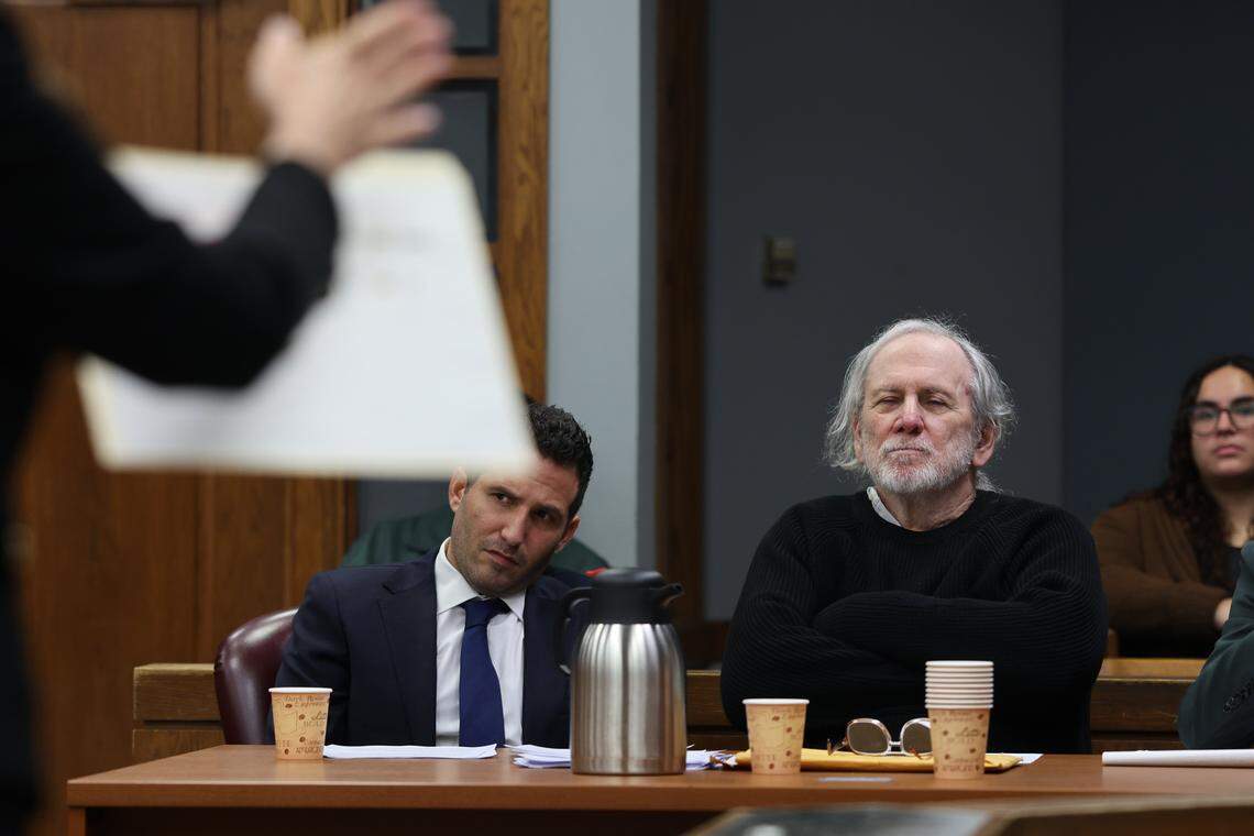 Defense attorney Alex Shear, left, and his client Robert Koehler, right, listen closely to the opening argument of prosecutor Laura Adams, left, as she presents evidence to the jury during his trial in Courtroom 7-3 with Judge David Young presiding on October 28, 2025 at the Richard E. Gerstein Justice Building in Miami, Florida.