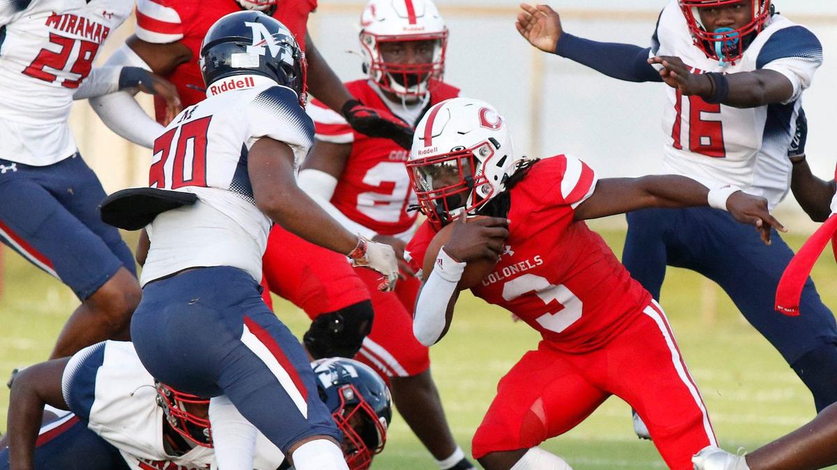 Plantation Colonels Zachariah Ray (3) attempts to evade Miramar Patriots defenders during football game on Friday, August 30, 2024 at PAL Field in Plantation.