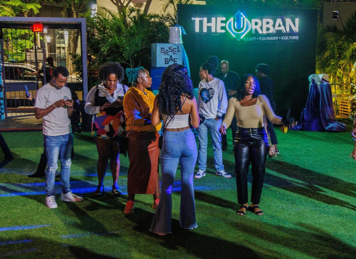 Guests enjoy the music and the ambiance during the Basel B.A.E celebrated at The Urban during the Miami Art Week in Overtown, on Friday December 8, 2023.