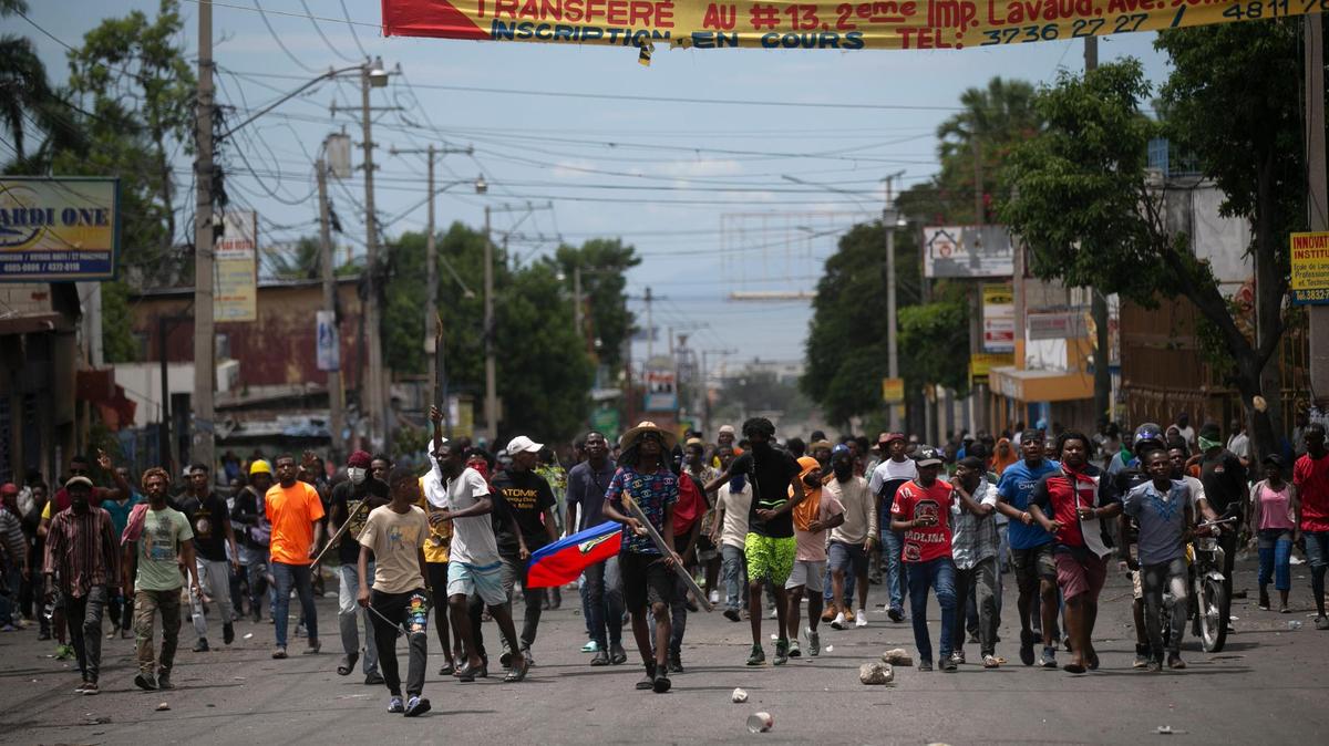Demonstrators protest against fuel price hikes and to demand that Haitian Prime Minister Ariel Henry step down, in Port-au-Prince, Haiti, Monday, Sept. 19, 2022.