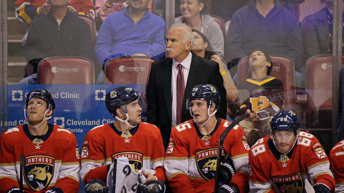 Florida Panthers head coach Joel Quenneville looks from the bench during the second period of an NHL regular season hockey game against the Boston Bruins at the BB&T Center on Thursday, March 5, 2020 in Sunrise.